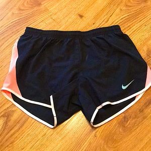 Nike black and pink athletic shorts.